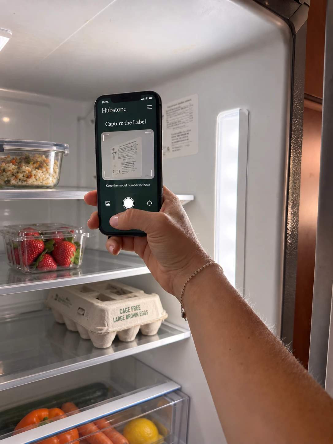 Taking a photo of the refrigerator’s model label